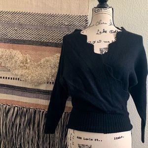 Black scalloped crossover sweater